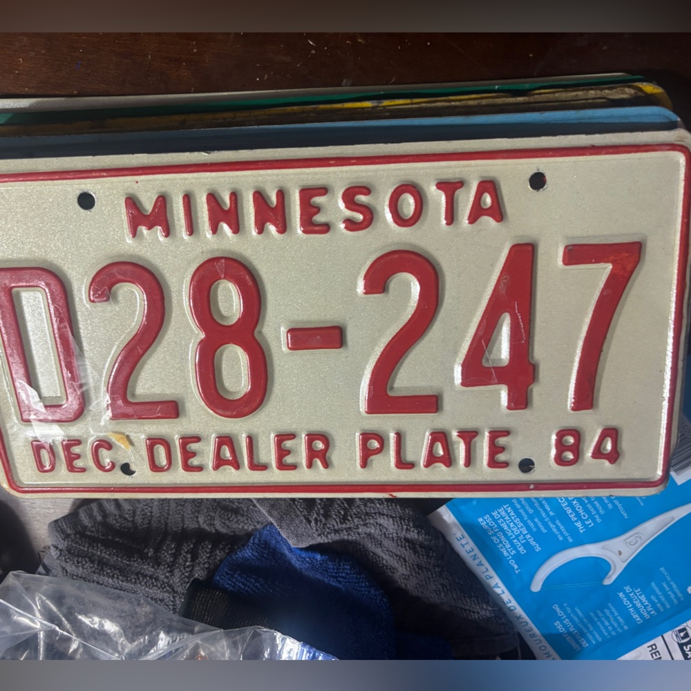 Vintage Minnesota License Plate with Red Lettering